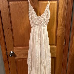 Ancient Rome, white, maxi length, floaty dress with a crochet, top, open back.